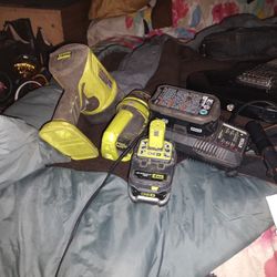 Two 4 Amp Hour Ryobi Batteries Ryobi Zen And High Beam Spotlight Ryobi Flashlight And Ryobi Charger