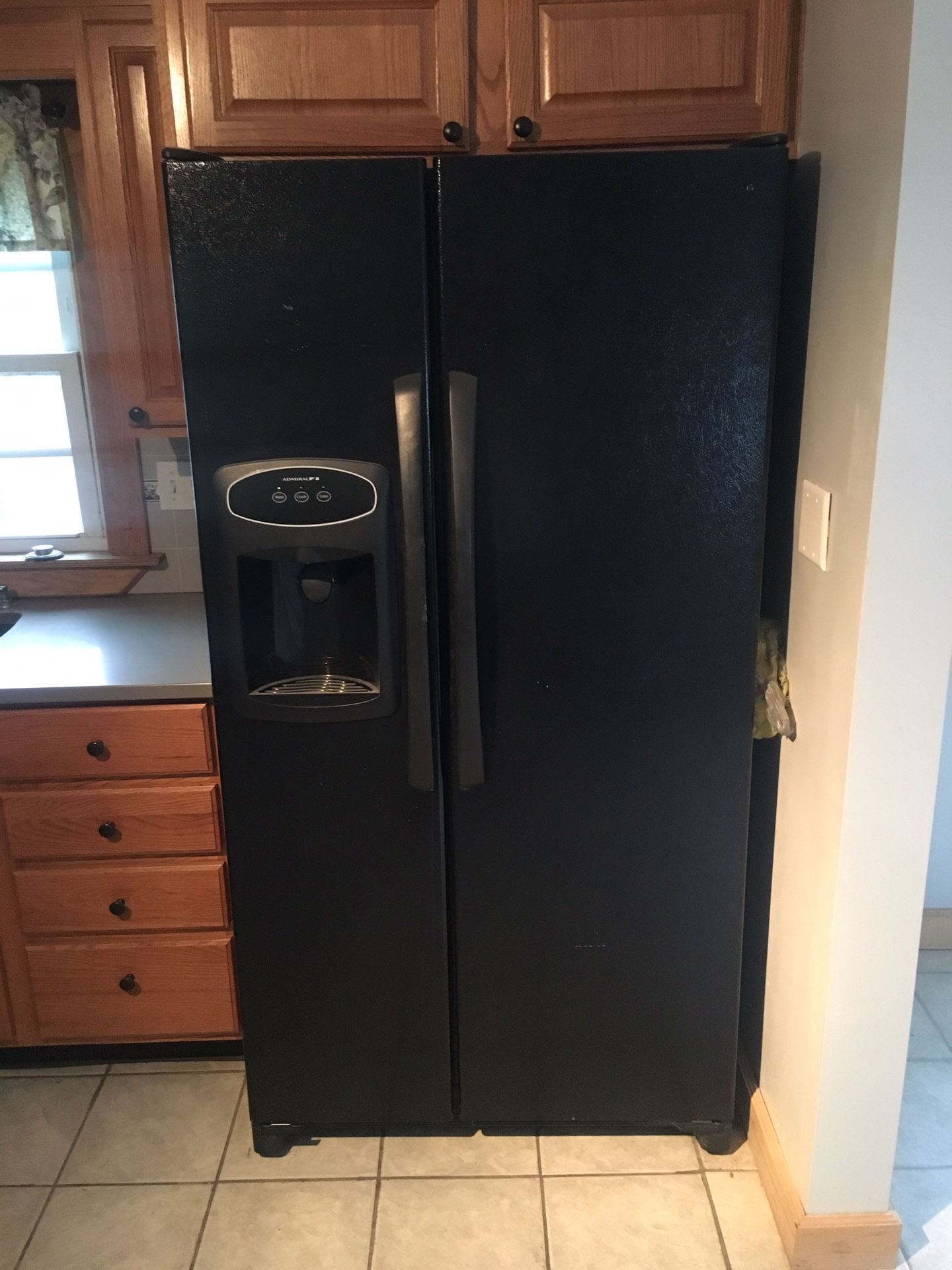 Matching kitchen appliances ( refrigerator, dish washer and electric oven)