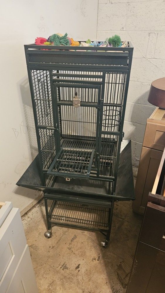 Cage for parrots.
