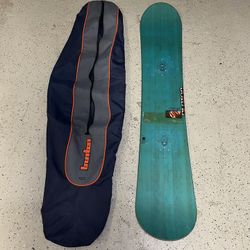 Burton Snowboard 154 and Travel Bag