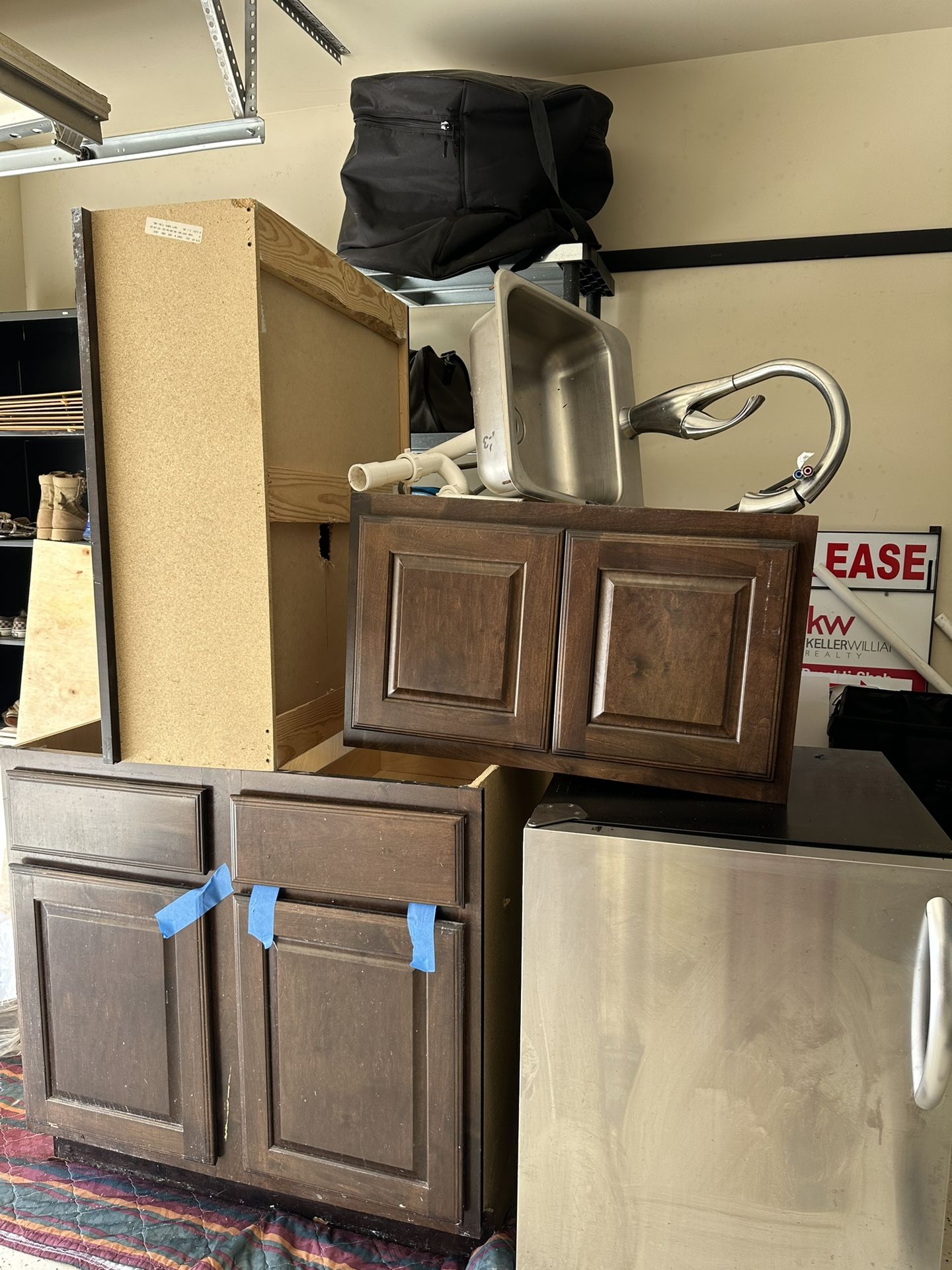 Kitchenette Refrigerator, Sink, & Cabinets