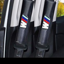 BMW Carbon Seat Belt Covers.   Door Projector Logo Lights and Rim Caps Available Etc