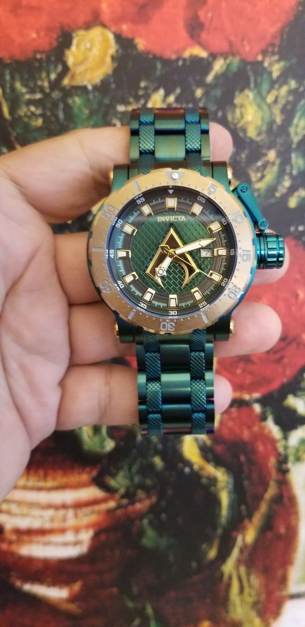 Invicta Aquaman automatic Coliation Force bracelet watch.