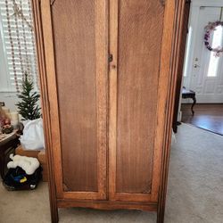 Antique armoire with shelving.