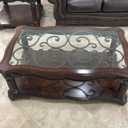 Ashley Furniture Coffee Table with Glass and Metal Inlay