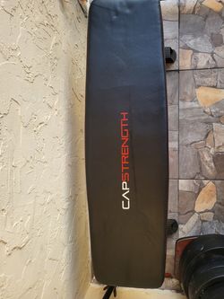 VENDO BASÉ CON  SU BARRA  Y PESAS