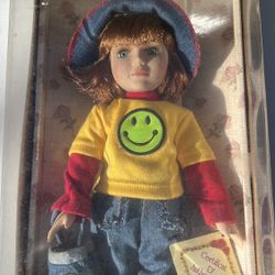 Genuine porcelain bisque doll in the original box