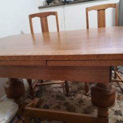 Antique Tiger wood tables and 4 chairs 2ftx66x42H 1 ft extention to each side can seat 6 to 8