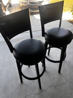 2 Leather Swivel Stools 