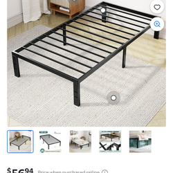 Black metal twin bed frame