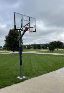 Goaliath 54 inch in ground basketball hoop, adjustable basketball court