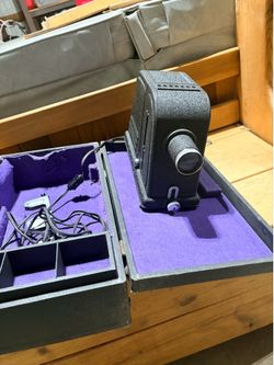 Very old film projecter and sweet case