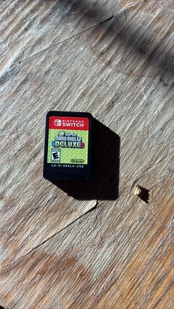Nentendo game card super Mario bros U deluxe
