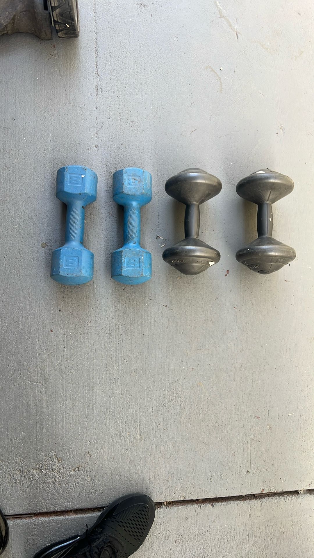 Two Sets Of Dumbbells