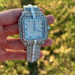 All silver Cartier bust down watch