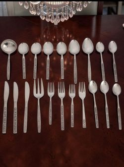 (Lot Of 20) Assorted Oneida Northland Spring Fever Stainless Steel Flatware Set. Based on a visual inspection of the image, the flatware pieces genera
