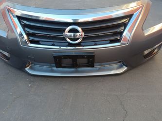 2013-2015 Nissan Altima Complete Front Bumper With All The Accessories.