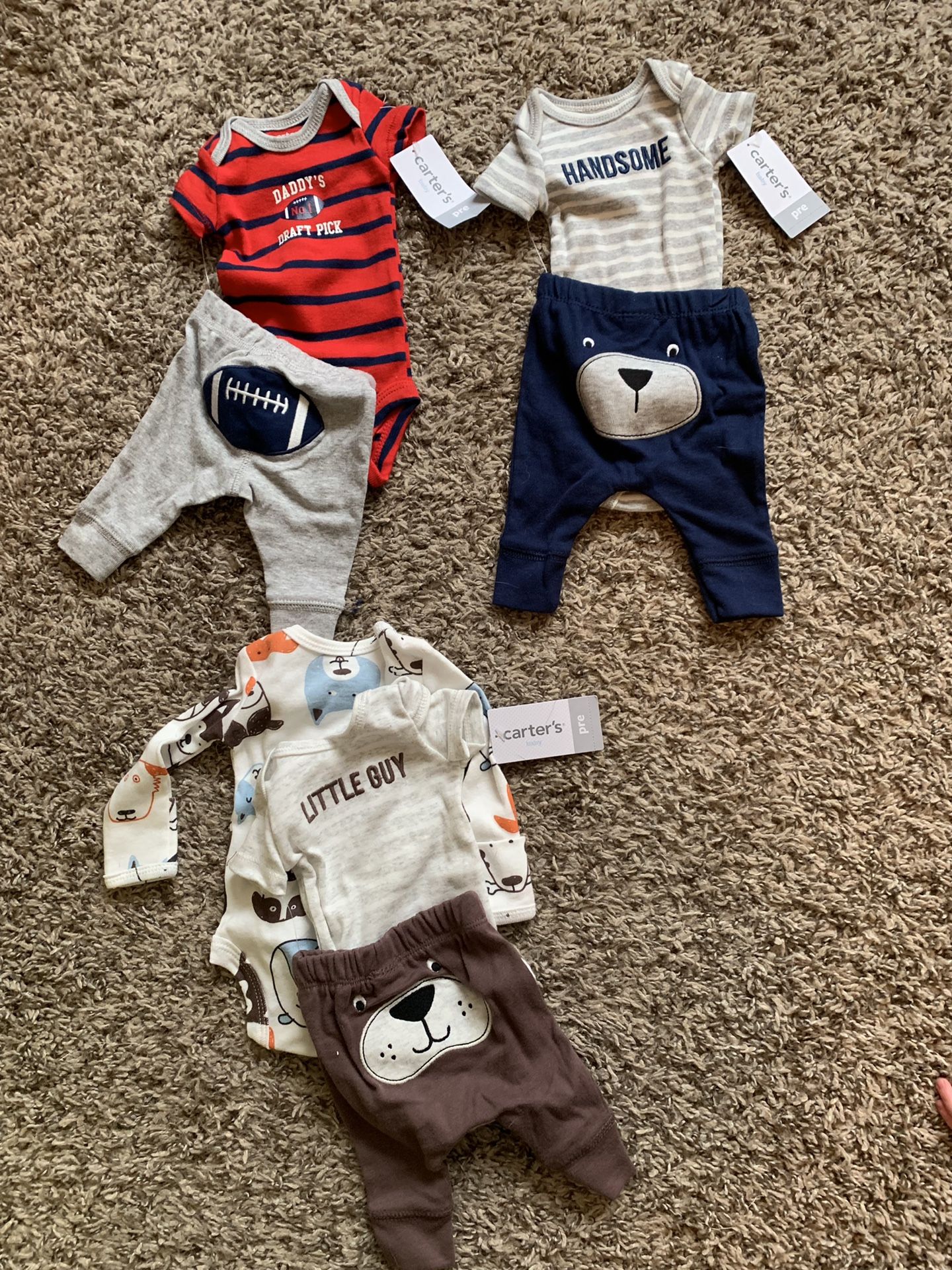 Premi baby outfits tags still on!