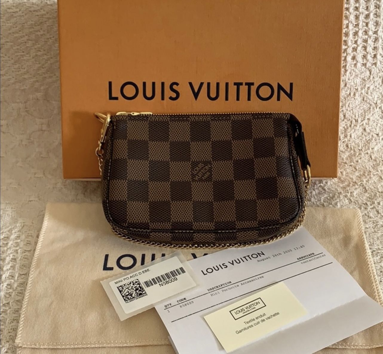 AUTHENTIC Pre-Loved Louis Vuitton Mini Pochette Accessoires