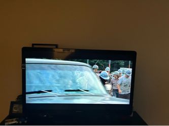 65 inch Philly TV and rug￼
