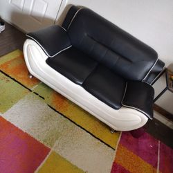 Black And White Leather Love Seat