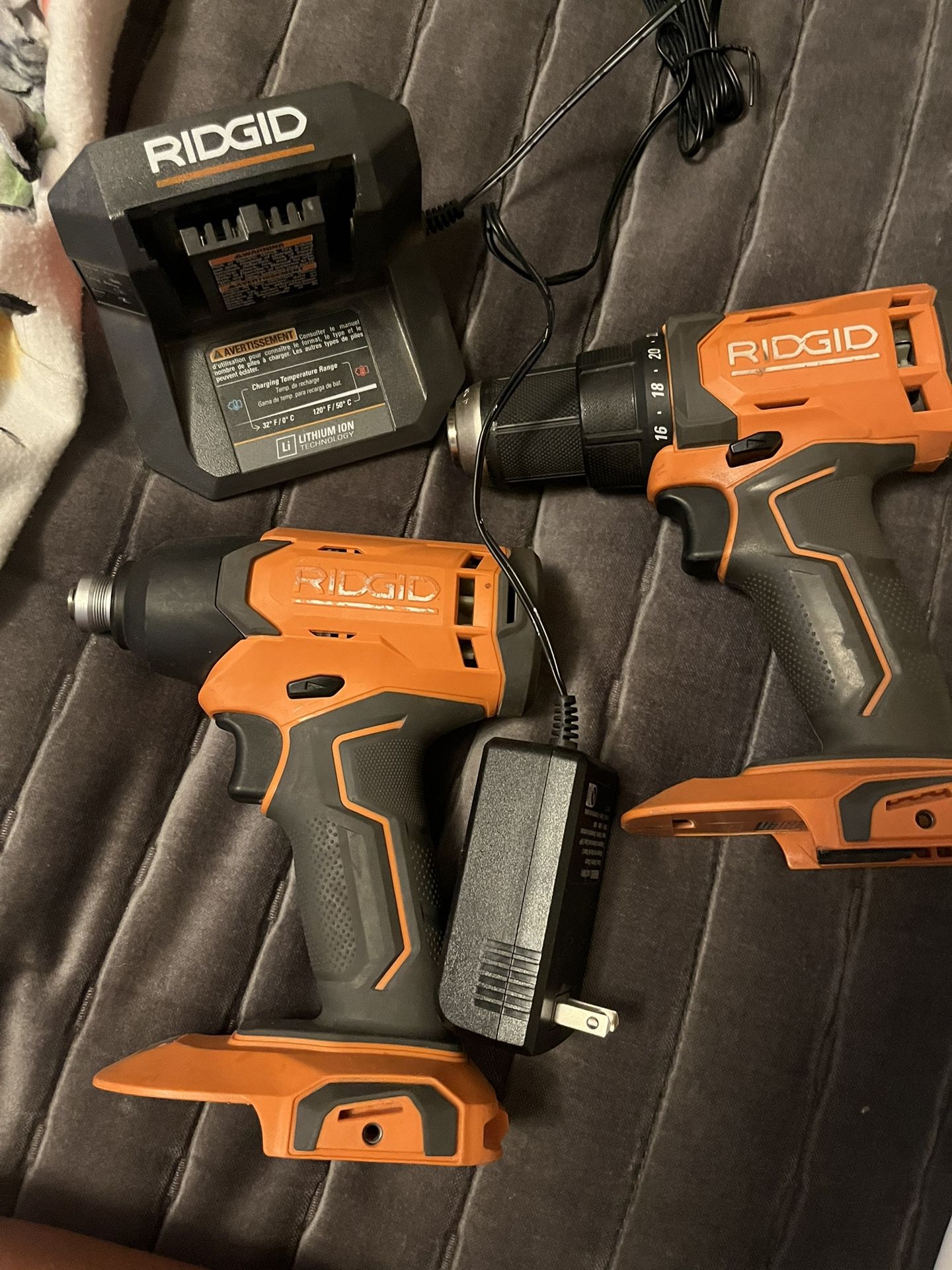 Ridgid Cordless And Impact Drills. With Charger No Battery’s