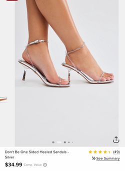 Silver heels (size 6)