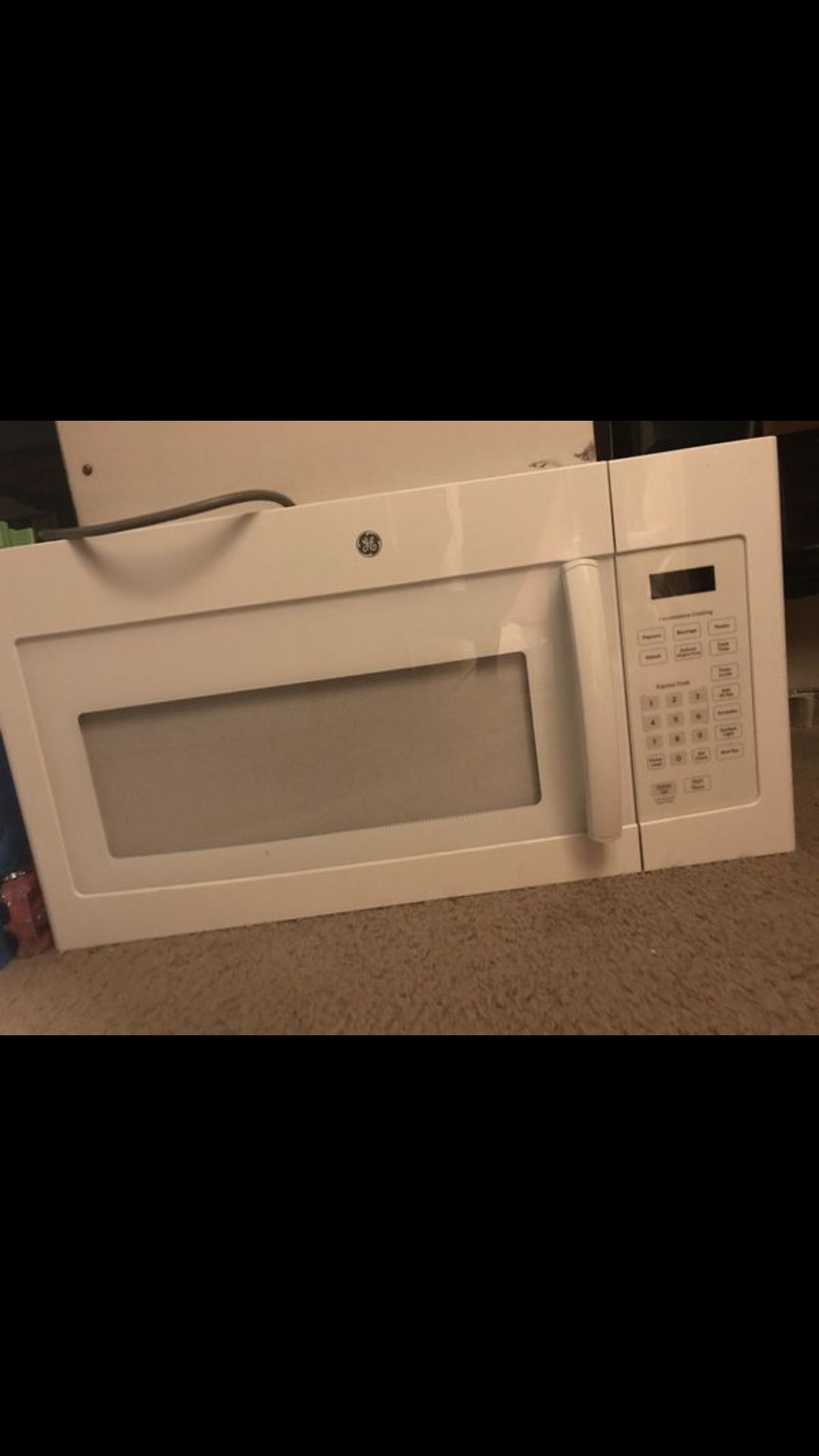 New extra large under the counter microwave can be used to sit on the counter, 30 inches long 15 inches wide