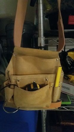 Brand new saddle bag and belt with extras...