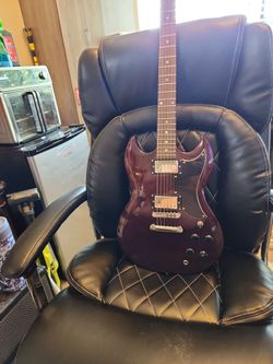 Jay Turser SG style guitar.