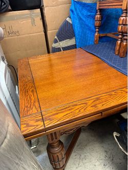 Jacobean-style oak dining table w/ 6  chairs & leaf - feature intricate wood carvings - Excellent Condition- 60” x 38” not Counting leaf