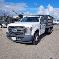 Ford F350 12’ Stakebed w/ Lift Gate