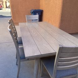 Grey green farm table with four chairs and a bench for sale as is wear and tear $375 or best offer !