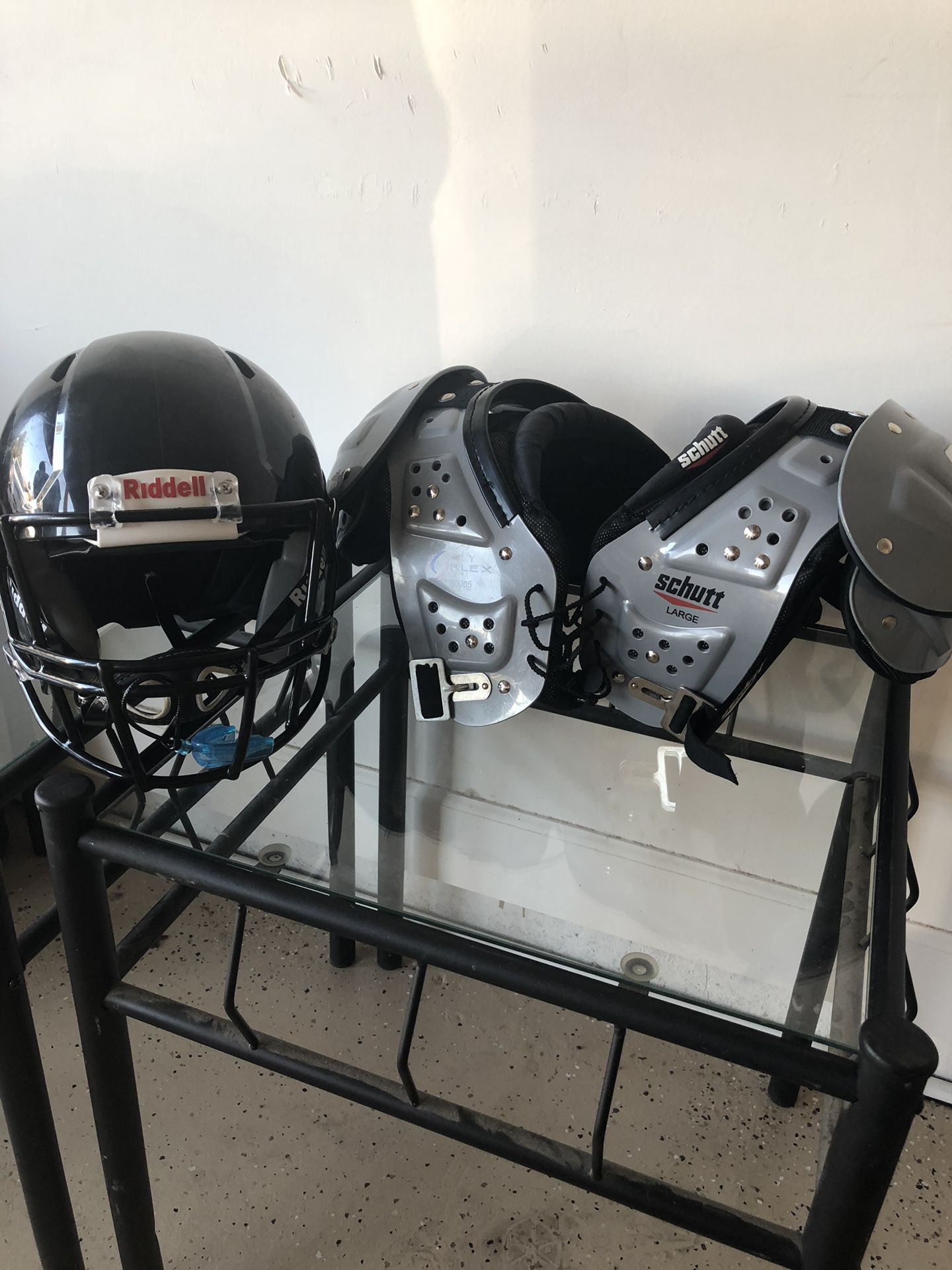 Youth football pads and youth helmet