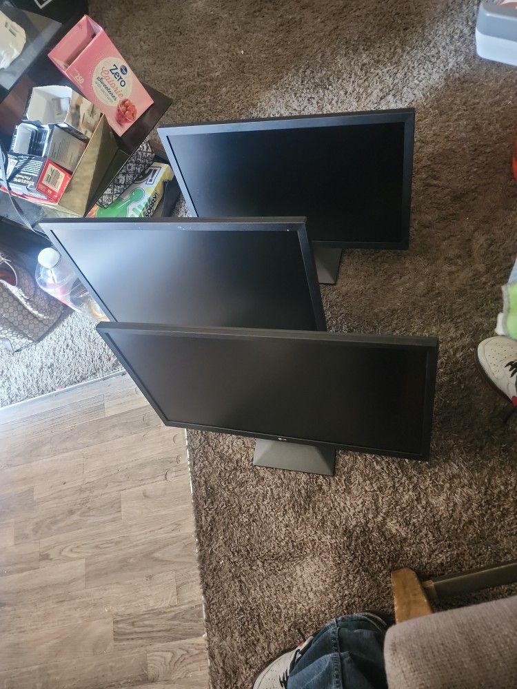 Three LG Monitors