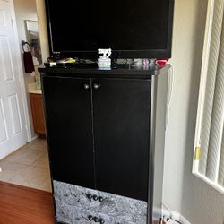 42-inch TV and Armoire