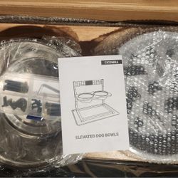 Elevated DOG Bowls.  Brand New Still In Box.  Comes With A Mat To Put Under It