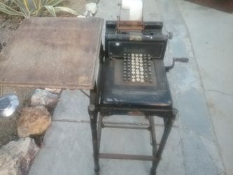 Antique adding machine with work table