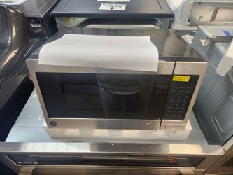 0.7 cu. ft. 700-Watt Spacemaker Countertop Microwave in Stainless Steel