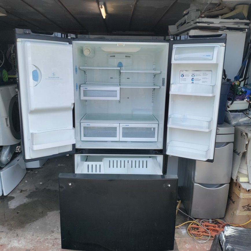 rare black LG French door isometer fridge works perfect with warranty