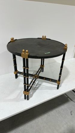 Wood table with gold painted accents