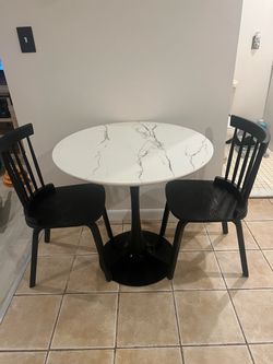 Round Marble-Top Dining Table with 2 Black Chairs