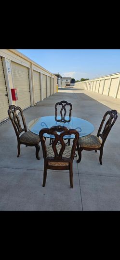 54" table with 4 chairs for sale