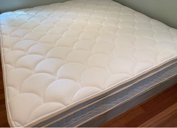 King bed and upholstered platform frame.