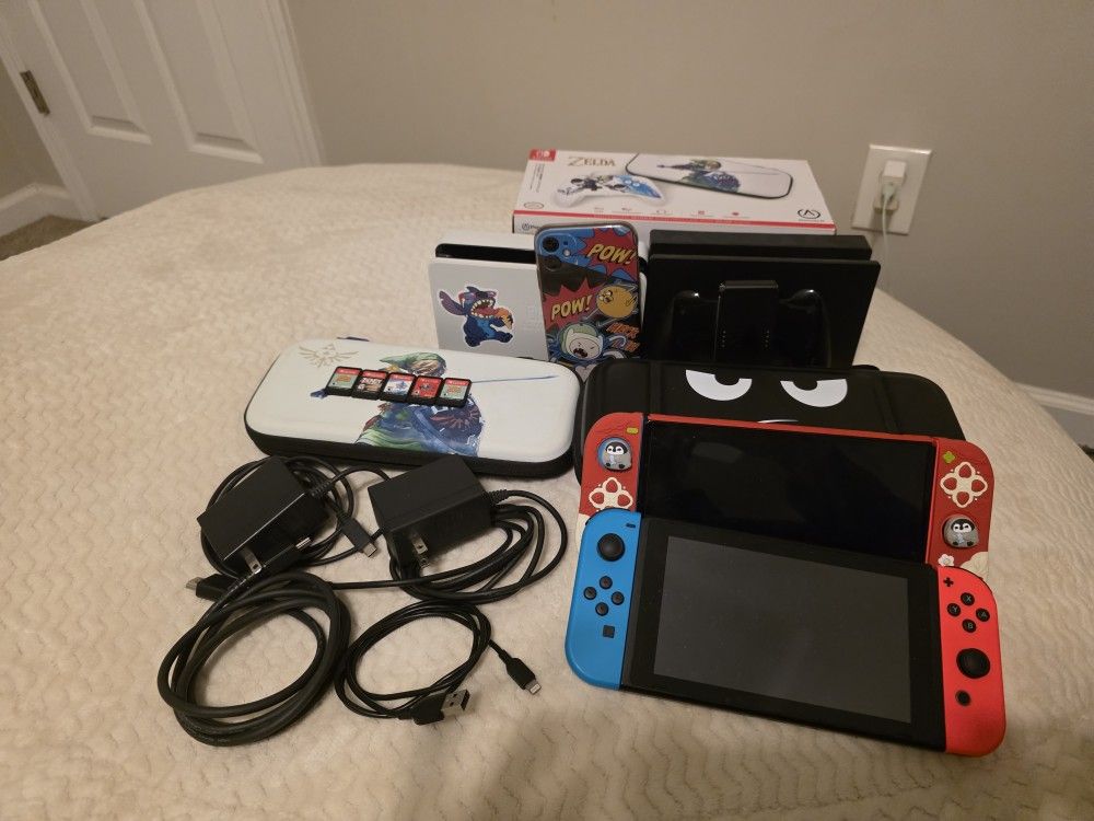 Nintendo Switches (OLED, Regular) Accessories and games along with an Iphone, wireless earbuds all cords included