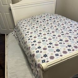 Strong Wood full bed and twin bed under. With brew new mattress, used just for guest.
