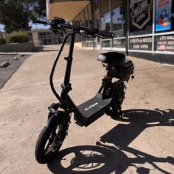 Brand New Sitting Down Scooter.