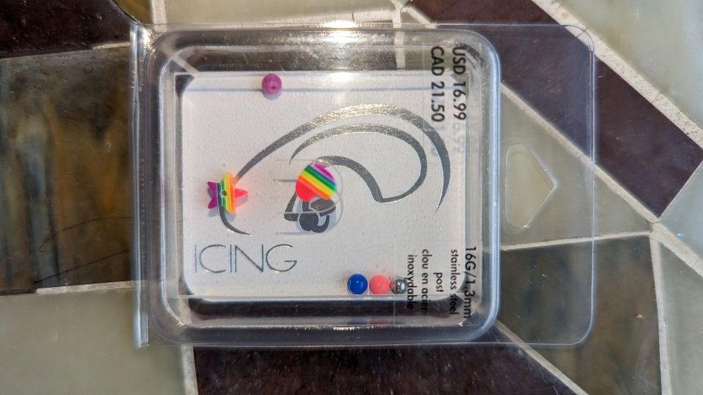 BRAND NEW 16 Guage Rainbow earring with extra interchangeable barbells.