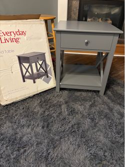 End table with drawer and lower shelf