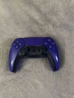 Purple/white PlayStation controllers